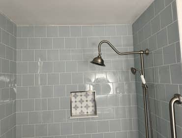 Photos by Martin Construction Services LLC #4 Bath renovation, removed everything but the tub. Installed tile floors and walls, sink, toilet, mirror an