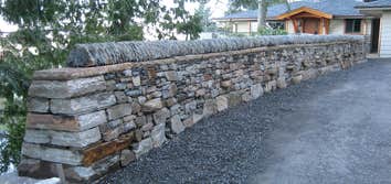 Dry Stone Walling project of Borrowed Ground Each dry stone walling project is built by professional dry stone masons. We specialize in building high q