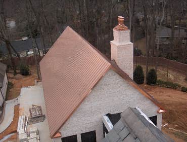Applied Roofing Technology / Projects Copper Roofs, chimney caps & conductor head.