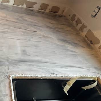 Photos by On-It LLC #1 Cover existing laminate countertop with a epoxy for a marbleled look.