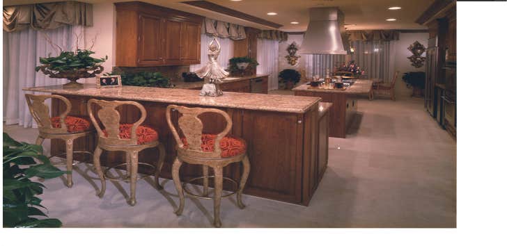 Coastal Marble & Granite Inc Project 1 Granite Countertops with 1 1/2" Ful bulnose edge detail and Travertine flooring.