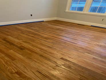 Photos by T Harvey Construction & Mgmt Inc #3 Removed old plank flooring, Installed new Sub flooring, Installed Red oak Hardwood unfinished. Stained an