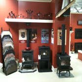 Wood Stoves Left: H300 Cast Iron wood-burning stove by Hampton Fireplace Products; Middle: Alterra CS1200 wood-burning stove by Regency Fireplace Produ