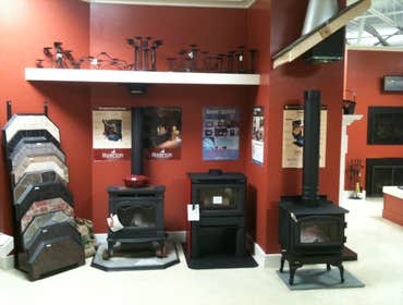 Wood Stoves Left: H300 Cast Iron wood-burning stove by Hampton Fireplace Products; Middle: Alterra CS1200 wood-burning stove by Regency Fireplace Produ