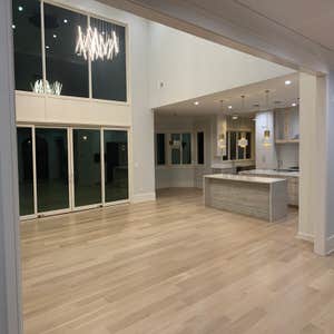 Photos by General Hardwood Flooring Inc #1 White oak 5”x3/4 installed, sanded and refinished with custom stain color