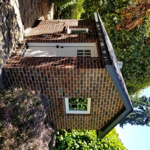 Tranquil Backyard Pool As you step into this remarkable sanctuary, a glistening swimming pool takes center stage, surrounded by paver slabs that...