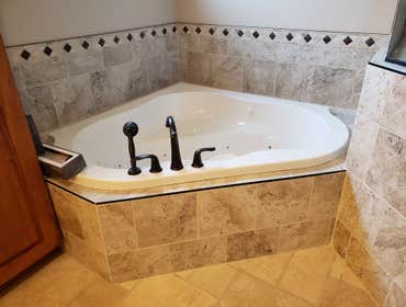 Photos by North Country Construction Inc #1 We built this gorgeous 5,000 SF house for a client in the powderhorn. It has a attached 3 car garage on a n