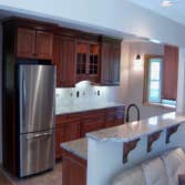 Photo(s) from Vision Homes of NY Inc. Complete kitchen remodel.
Open existing kitchen walls to hallway and living room.
Added Bay window.