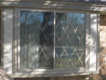 Dallas Texas Window Project Kensington Energy Star (TM) vinyl casement and picture replacement windows.