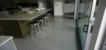Newport Beach Custom Home A Family buying an Modern style Home wanted to get concrete flooring to replace the existing Saltio Tile, complete the look, 