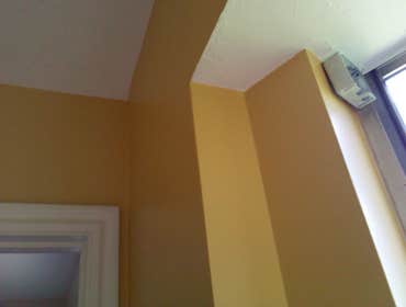 Close up of interior re-paint walls and ceilings
