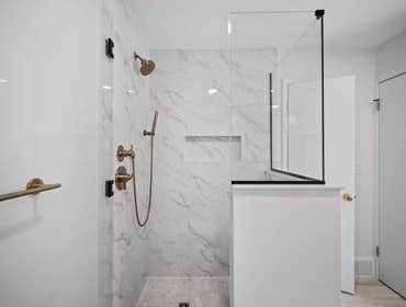 Bathroom Remodel - Project Type: Bathroom Remodel
Products Used: Tile, flooring, vanity, cabinets, faucets, hardware, sink, and mirror.