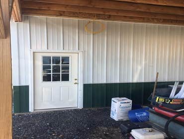Photos by Stormbringer Construction #16 Customer requested a add on garage, with custom car lift and oversize custom garage door