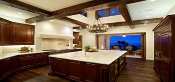 La Jolla Custom Home Installation of Provenza flooring and custom stained and scraped stair treads.