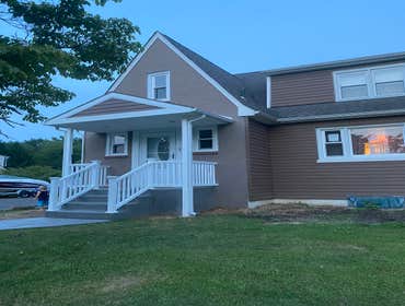 Southampton Front Porch Added a roof to an existing front porch to provide some weather protection and curb appeal