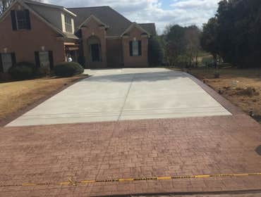 Photos by Stamped Concrete Denver LLC #1 Stamped concrete, often called textured or imprinted concrete, replicates the look of many different stones su