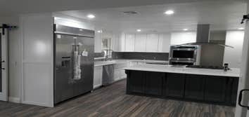 Photos by Ruben Garcia Dba Fast Track Construction #2 Moved kitchen into bedroom and joined, living, kitchen and dinning area. All apliances high end.