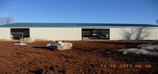 Project in Culpeper VA We constructed the building, installed under ground utilities (water, sewer, storm) and erected the retaining wall. We also did 