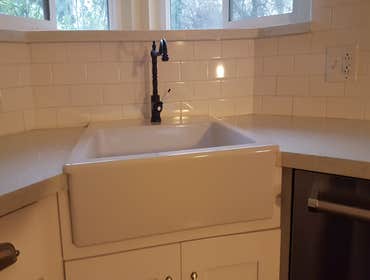 Budget kitchen remodel Budget Remodel That included demo work, some sheetrock, minor electrical, new tile flooring, new cabinets, counter top and subwa