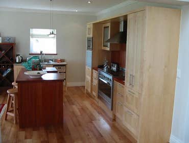 LAM Woodworks Here are some pictures of work done using different materials, from stained Mahogany to solid Bubinga or Beech, from Maple to Poplar for