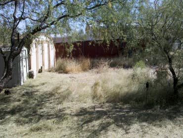 Thompson Pro Landscaping Project Simple clean up in Benson A.Z. It started as a one or two day clean up.From there stucco patch's on the house and demo