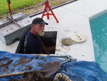 Pool Leak Pros Project Deck cut for a broken skimmer line repair.