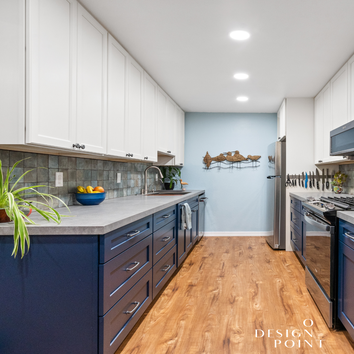 Pop of Color, Modern Designs A modern galley kitchen remodel featuring a timeless two-tone design. The upper cabinets in crisp white create a bright, o