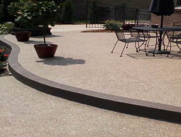 Exposed aggregate Patio photo by Potoroka Concrete