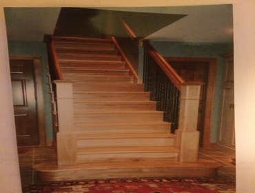 Staircase and rails with iron balusters