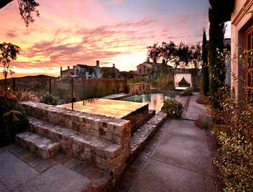 Urban Landscape Inc Project Custom Pool, covered structure, and landscape design and construction