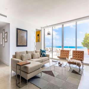 Oceanside Penthouse Gorgeous 3 Bed 3 Bath with spacious living area offers spectacular direct Ocean Views which reflects the vision of modern...