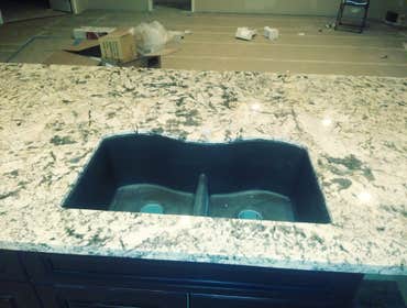 Photos by Expression Stone Construction #4 Custom cabinets ,granite sink ,3cm cosmos granite ,lvt floor