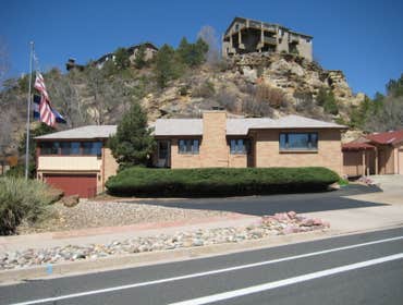 The Jones Residence Full roof replacement with a stone-coated metal product as a superb tile replica.