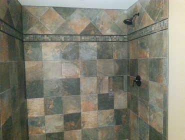 Shower tile with hidden niche
