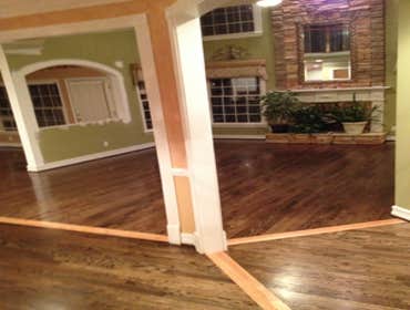 Hardwood floor refinishing in Lawrenceville, GA - Webb Gin House area Hardwood floor refinishing project in Lawrenceviie, GA. FLoors were stained with 