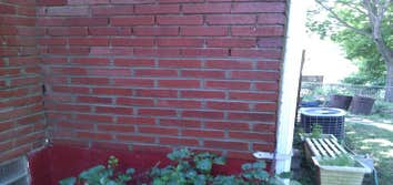 Repointing House Grind-out existing mortar and replace.