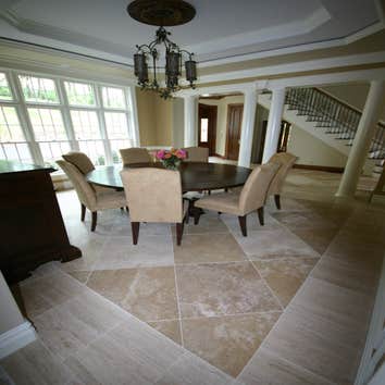 Scandone House This is a new construction home tile and marble installation custom kitchen and bath work.Custom marble in main foyer, custom work throu