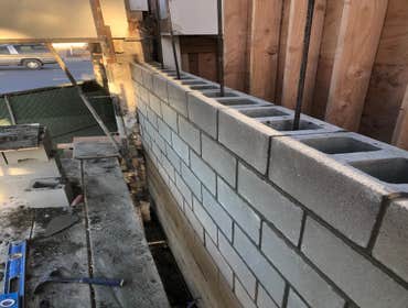 Load bearing masonry wall