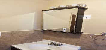Bathroom remodeling Complete renovation of bathroom. Removed old bath tub and installed standing shower. Replaced toilet, vanity, mirror, lights, d