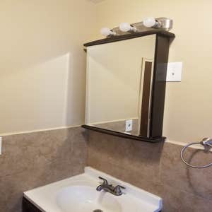 Bathroom remodeling Complete renovation of bathroom. Removed old bath tub and installed standing shower. Replaced toilet, vanity, mirror, ...