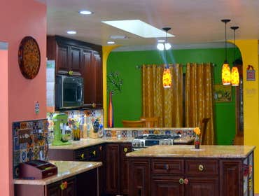 Talavera-style Kitchen full remodel Lake Estates full kitchen remodel with wood cabinets, fabricated Rose Gold granite tops, minor construction, new el