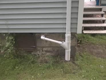 Discharge Line to Downspout