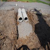 Project in Culpeper VA We constructed the building, installed under ground utilities (water, sewer, storm) and erected the retaining wall. We also did 
