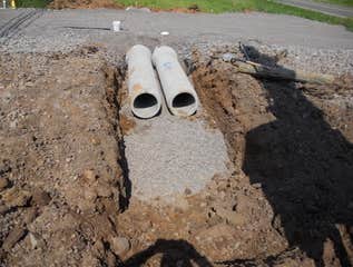Project in Culpeper VA We constructed the building, installed under ground utilities (water, sewer, storm) and erected the retaining wall. We also did 