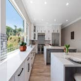 Kitchen with 2 Kitchen Islands and Large Picture Window