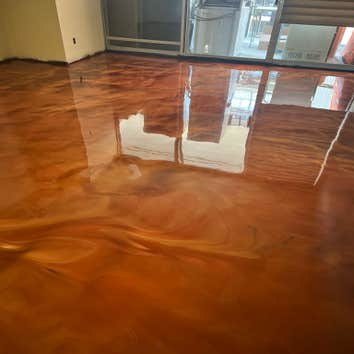 Photos by Colorado Concrete Restoration #1 We installed a Polishable overlay over the existing concrete, and polished it up to a 400 grit for this reta