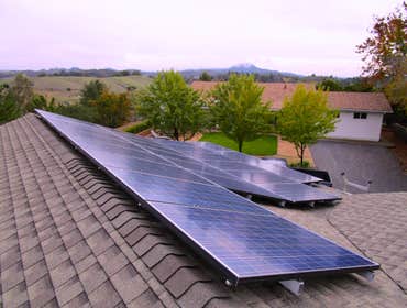 Installations Green Stock Solar ground-mounts and installations on comp, tile, and metal roofs!