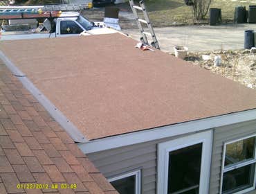 This is a panoramic display of a variety of photos from numerous jobs. We are showing everything from a flat membrane roof to box gutter and chimney re