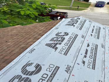 Photos by Housetop Roofing Inc #3 Re-Roof Dimensional Shingles and install skylights