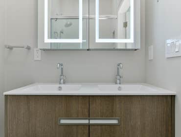 Photos by Urbanity Homes #1 Maverick St Boston MA
The Maverick Street condos are a study in materials. Simple geometries are given interest with contra